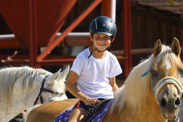 a boy at summer horse camps